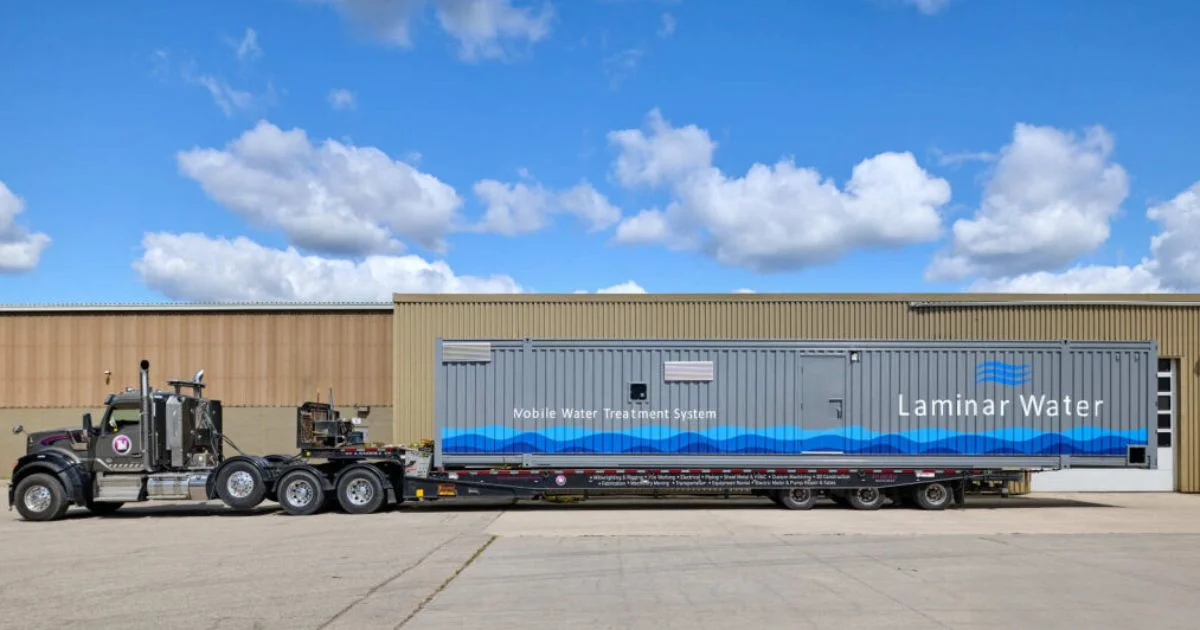 Mobile water treatment unit transported on flatbed truck.